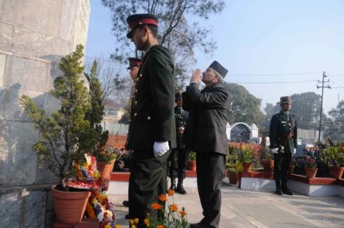 LOOKING UP: PM Baburam Bhattarai pays his respect at the Martyr's Gate on Tuesday, on the occassion of Martyr's Day.