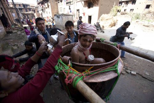 HOLY WATER: A local of Thecho is worshipped as Lord Madhav Narayan on Saturday, as part of the month-long Madhav Narayan festival. Thecho is a village in the south of the Kathmandu Valley.