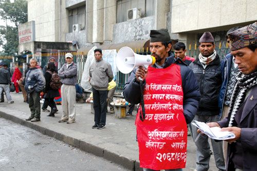 LOUD AND OUT: Baliraj Shahi, a campaigner for Karnali Sinja Khas province, calling on supporters on Wednesday outside Bir Hospital, Kathmandu.