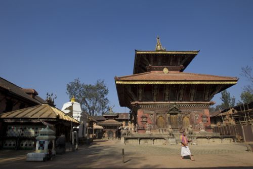 DAILY RITUAL: A priest returns after his daily prayers at Changunarayan temple on Saturday.