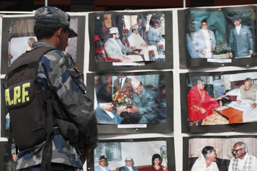 LOOKING BACK: APF personnel at a photo exhibition of Late NC leader Krishna Prasad Bhattarai on the first obituary at his resident Bade Gaun, Lalitpur on Saturday.