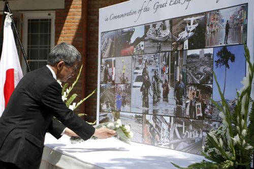 IN MEMORY: Japanese Ambassador to Nepal Kunio Takahashi pays tribute to victims of last year's earthquake and subsequent tsunami in Japan, at a memorial program at the ambassador's residence on Sunday. The disaster left 15,848 dead and 3,305 missing.