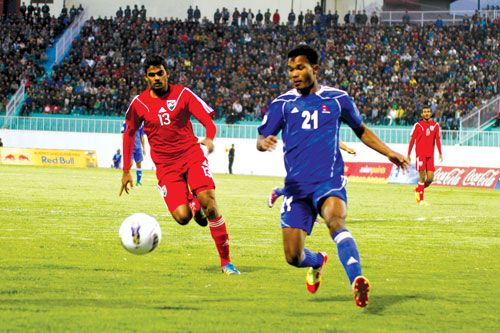 LOOSE BALL: Nepal plays its second game at the AFC Challenge Cup against Maldives on Saturday at Dasrath Stadium. Nepal lost the game 0-1, eliminating the country's chances of progressing to the semi-finals.