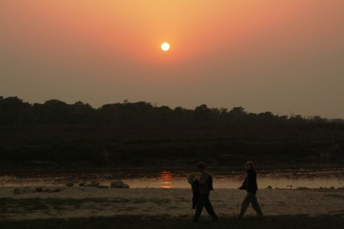 SEASON BEGINS: Tourists stroll in the banks of Rapti in Sauraha, Chitwan, on Saturday.