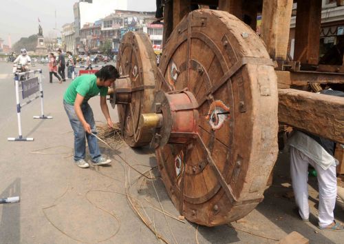 UNDER CONSTRUCTION: Locals build the chariot of Seto Macchendranath in Darbar Marg, in preparation of Chaitra Dasain, when the Seto Macchendranath procession begins.