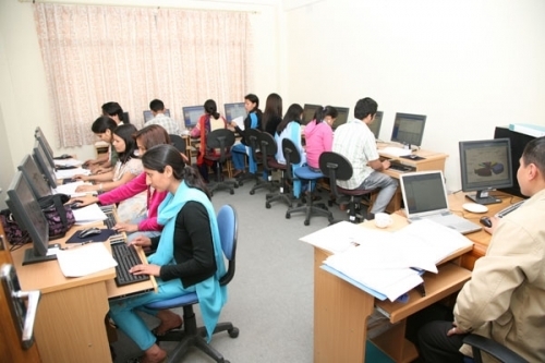 NUMBERCRUNCH: Statisticians analysing data at the Press Council's Media Monitoring Centre.