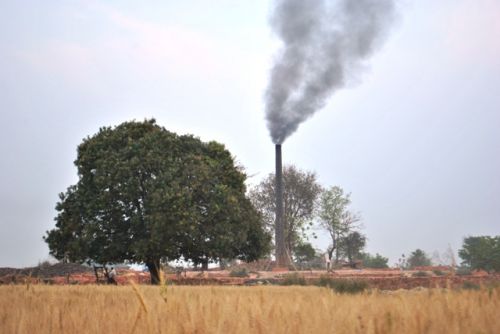 SMOKEY GROWTH: Black smoke arises from a brick klin in Sunauli, Rupendehi, earlier this week.