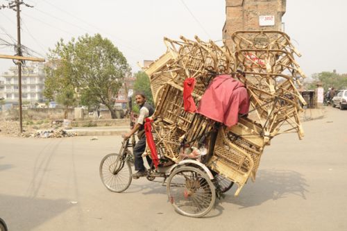 SUPER RICKSHAW: A man transports a stack of bamboo furniture on his rickshaw in Kathmandu on Wednesday morning.