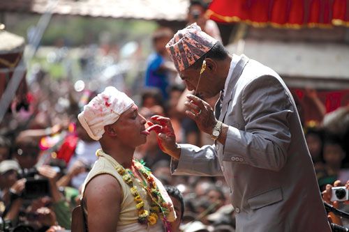READY? Jujubhai Shrestha, a local of Bode village, volunteers to get his tongue pierced, following the annual festival of Bisket Jatra in Thimi on Saturday. The ritual is believed to bring good luck to the villagers.