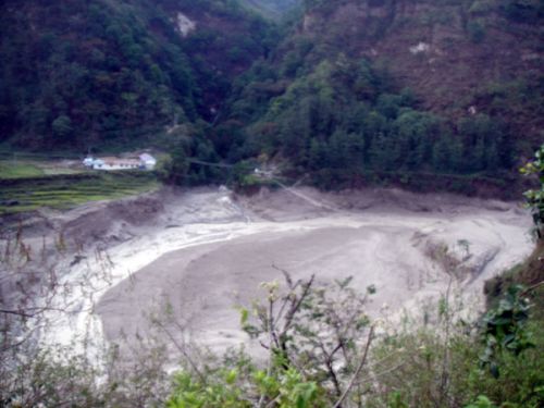 High rise: Saturday's flashflood in the Seti River rose to almost 15 feet around fields in Khairapani