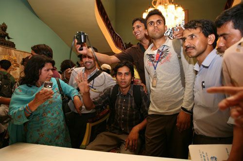 JOURNOS GO BERSERK: Reporters take turns sitting on the chair from which Gyanendra spoke at a press conference on Wednesday at Naryanhiti.