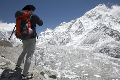 PERFECT CLICK: A tourist stops to take a picture of the Nuptse mountain in the Khumbu region, last week.