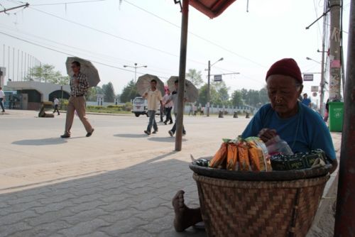 BUSINESS AS USUAL: A street vendor sets up her shop in front of the CA building in Baneshwor on the third day of banda called by Nepal Federation of Indigenous Nationalities, demanding identity-based federalism.