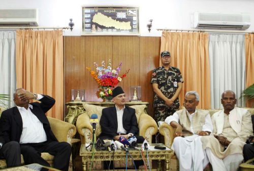 SAVING FACE: Prime Minister Baburam Bhattarai before he began his midnight address to the nation, accompanied by Bijay Kumar Gachhedar, Rajendra Mahato and Mahendra Yadav at Baluwater. In his short speech, the PM announced the cabinet's decision to hold fresh election of the CA. The NC, UML and other fringe parties have rejected the proposal. Parties are now waiting for the President's approval of the decision.