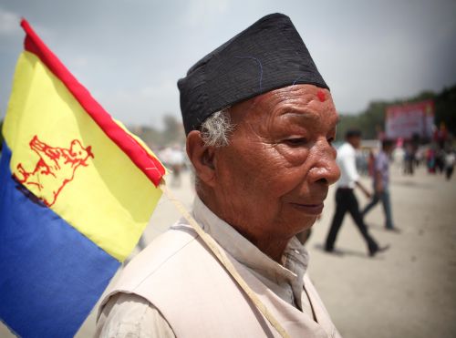 FLAG HOLDER: A supporter at a mass meeting organised by the pro-royalist Rastriya Prajatantra Party Nepal (RPP-N) at Khula Manch on Saturday.