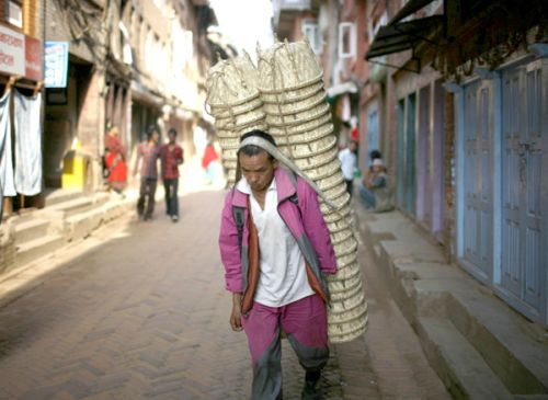 BASKETFUL OF LOAD: A local porter carries handmade baskets to the market on Monday morning in Bhaktapur.