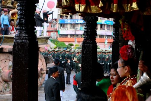 WHO'S THIS? The Kumari looks on as the bhoto, a jewel-studded vest, is displayed to the devotees to conclude the Red Machhindranath Jatra on Sunday in Jawlakhel, Lalitpur.
