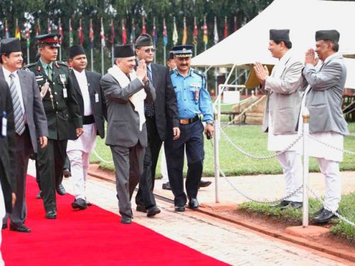 BACK IN TOWN: Prime Minister Baburam Bhattarai being greeted by officials at Tribhuvan International Airport on his return from Brazil. Bhattarai had gone to Brazil last week to participate in the Rio+20 summit.