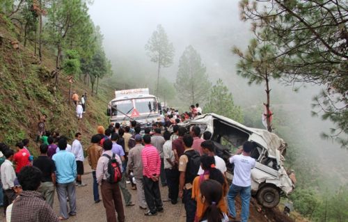 RISKY DRIVE: A microbus, which met with an accident Rubaskanda along the Bhimdatta Highway in Doti two weeks ago, being pulled out on Tuesday. Ten passengers were killed in the accident. PIC