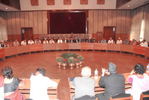 DOWN ON BUSINESS: Top leaders of all major parties sit for a round table at the International Convention Centre, Baneshwor, on Tuesday. The meeting ended on an agreement to bring a partial budget.