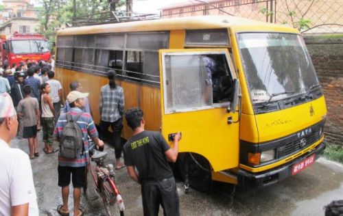 WRONG TARGETS: A school bus attacked in Patan on Monday morning by Maoist supporters. Several school buses have been attacked and also petrol bombed. PIC