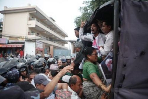 OFF YOU GO: Police arrest human rights activists protesting outside the PM's office in Baluwatar on Wednesday. PIC