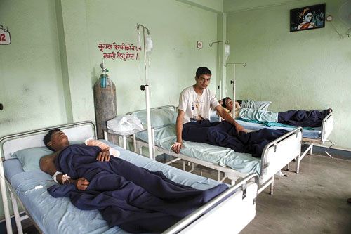 LUCKY SURVIVORS: Passengers injured in a bus accident in Dhading receiving treatment at Star Hospital in Kathmandu on Monday. The bus plunged into the Trishuli River, killing 16 and injuring 15 passengers.