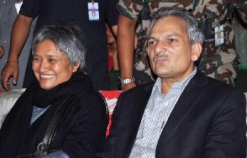 LAUGH OUT LOUD: PM Baburam Bhattarai and Hisila Yami watch Tite Jire Meri Bassai Gai Jatra show at Nepal Pragya Pratisthan in Kamaladi on Saturday PIC