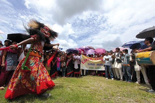 ETHNIC IDENTITY : People watch a Lakhe Dance in Birtamod, Jhapa during the program to mark the 18th International Day of the World's Indigenous People on Wednesday.