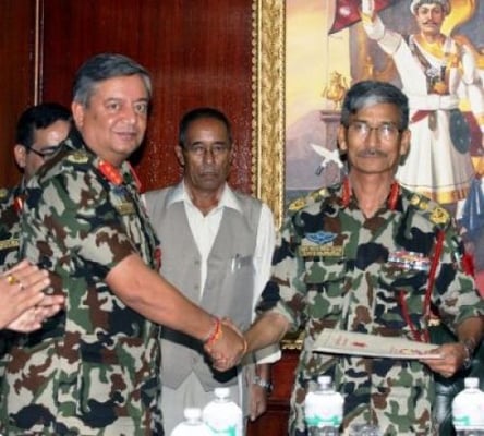 HANDOVER HANDSHAKE: CoAS Chhatra Man Singh Gurung hands over his duties to newly-appointed acting Army Chief Gaurav SJB Rana on Thursday at the Army Headquarter.