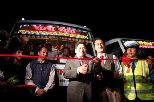 NIGHT OUT IN TOWN: Deputy Prime Minister and Minister for Foreign Affairs Narayankaji Shrestha (centre) inaugurates the newly introduced night bus service in Kathmandu on Friday nightPIC