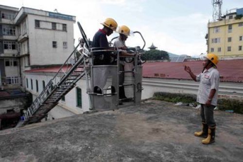 SERIOUS PREPARATIONS: Firemen practice drills with the recently donated fire truck at Juddha Barun Yantra in Pulchok on Tuesday morning.PIC
