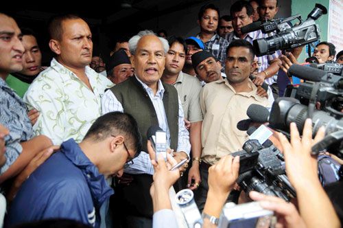 I SURRENDER: Former minister Khum Bahadur Khadka, who was convicted of corruption and sentenced to 18 months in prison by the Supreme Court arrives at Dillibazaar jail on Wednesday following his surrender in Kathmandu.