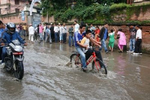 READY, GET SET, GO: The streets of Jamal were inundated after Monday's downpour making it difficult for vechile owners to pass through. PIC