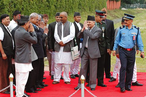 TEHRAN BOUND: Prime Minister Baburam Bhattarai bids farewell to member of his cabinet at Tribhuvan International Airport on Wednesday to partcipate in the 16th Non-Alignment Movement Summit in Tehran.
