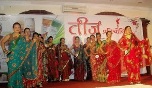 SARI ROUND: Women take part in a beauty contest during a program organised to celebrate Teej on Saturday evening in Parsa . PIC