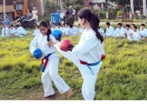 HAIYAA: Girls take part in a round of taekwondo sparring in Tansen on Monday. PIC