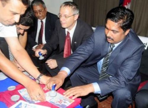 OFFICIAL STAMP: Minister for Information and Communication Raj Kishor Yadav and Ambassador of Israel Hanan Goder Goldberger put the 'first day cancellation' marks on the Everest and Dead Sea stamps on Tuesday.