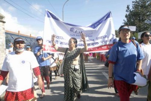 PIC : Maiti Nepal's founder Anuradha Koirala (center) at a rally marking National Anti-human Trafficking Day near Bhrikuti Mandap on Wednesday.