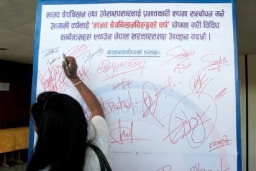 WRITING ON THE WALL: A signature campaign organised on Wednesday to mark National Anti-human Trafficking Day and demanding that next year be declared as "Year Against Human Trafficking".