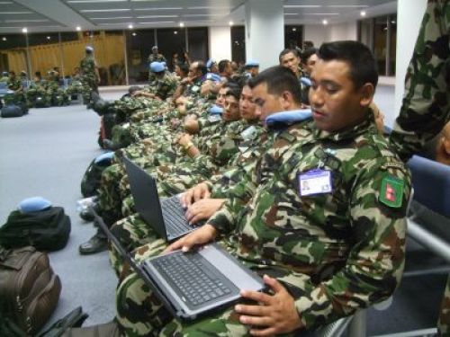 COMING HOME: Hours before heading home, Nepali soldiers in the UN Peacekeeping mission in Lebanon take the chance to chat online with their families at the airport in Beirut. PIC