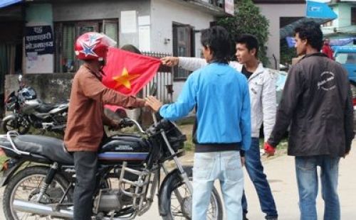 HOW DARE YOU: Youth members of the CPN-M stop a motorbike owner at Satdobato and order him to return home on Friday morning.PIC