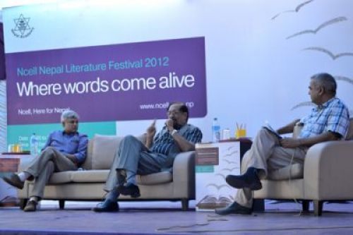 IT'S THE ECONOMY: Ram Sharan Mahat (middle) and Jhalak Subedi (left) discuss Nepal's economic policies during the Nepal Literature Festival on Sunday.