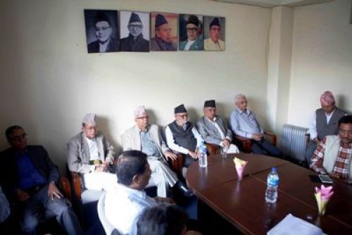 GHOSTS OF LEADERS PAST: Leaders of the NC, RPP and UML along with other opposition parties gather at the NC headquarters in Sanepa on Monday.