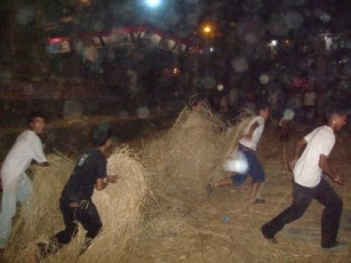 FUN ENDING: Once Indra Dhoja pole was knocked down to mark the end of Indra Jatra festival, people had fun in Hanuman Dhoka, Kathmandu, on Wednesday night.