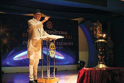 FINGER OF FUDGE: Prime Minister Koirala speaks at the inauguration of the new Rotary International District for Nepal on Tuesday.