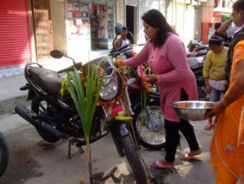 PLENTY FOR ALL: On the 9th day of Dasain, people also look after and bless their vehicles, in Kathmandu on Tuesday.