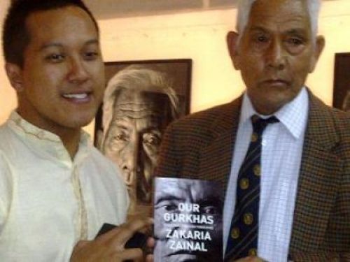 OUR GURKHAS: Singaporean photographer Zakaria Zainal (left) lauches his book 'Our Gurkhas: Singapore Through Their Eyes' during the travelling exhibition of the same name at Babar Mahal on Friday afternoon.