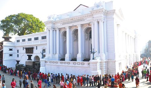 LONG PATIENCE: People queue for hours to get inside the Taleju Temple in Kathmandu Darbar Square on the day of Maha Navami. The temple opens for general public only once a year on the ninth day of Dasain.