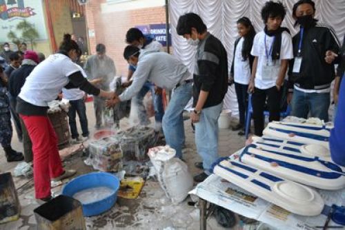 JUST BAKED: Artists make clay sculptures at the Kathmandu International Art Festival's installation at Bhrikuti Mandap on Monday.